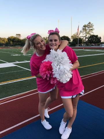 High school athletes support breast cancer awareness with pink uniforms  (Photos)