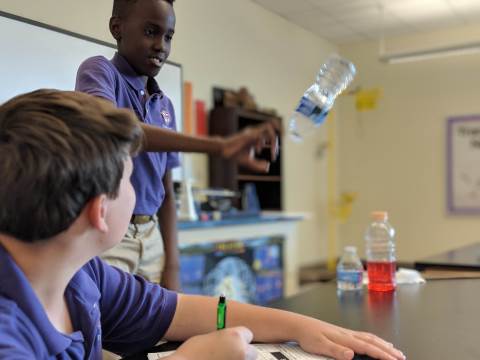 Bottle flipping' banned in schools after sweeping internet